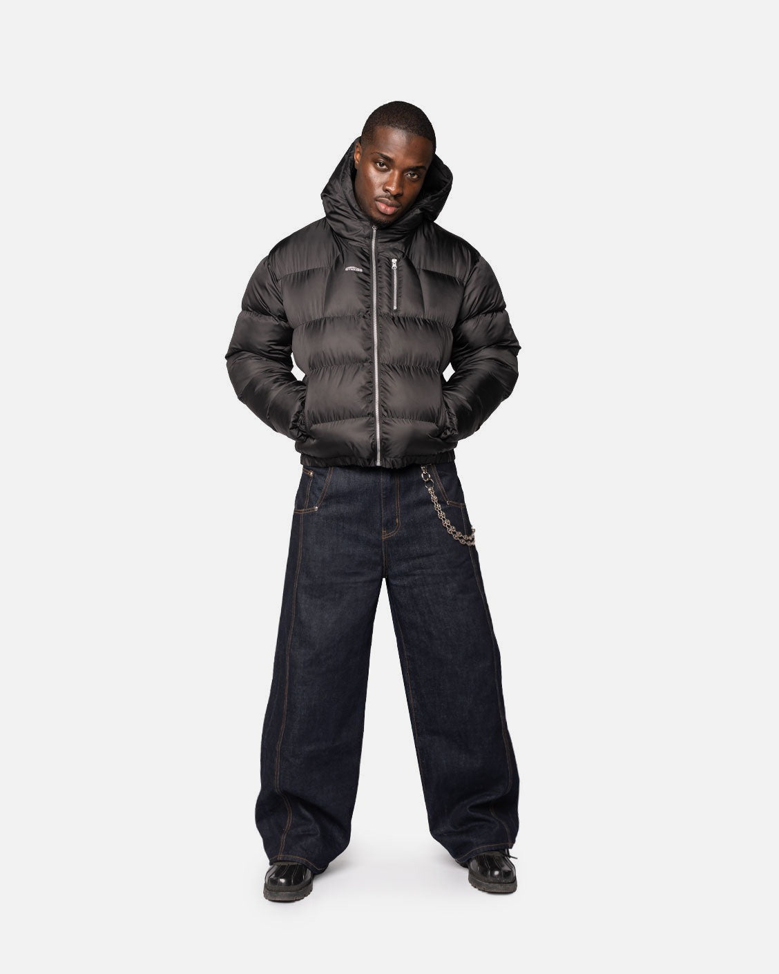 Apex Puffer Black, product view 3 on a light grey background