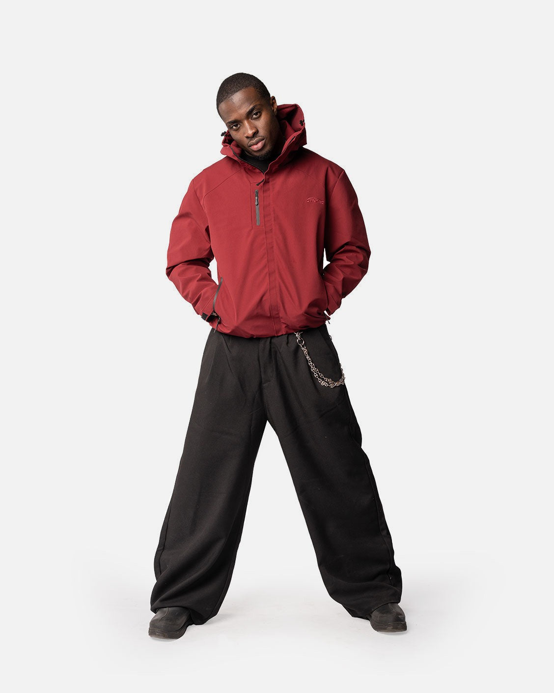 Delta Rain Jacket Bordeaux, product view 1 on a light grey background