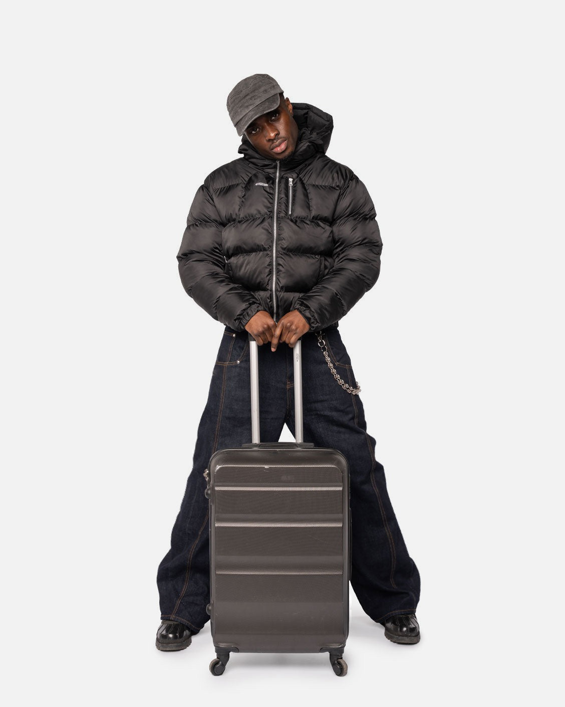 Apex Puffer Black, product view 1 on a light grey background