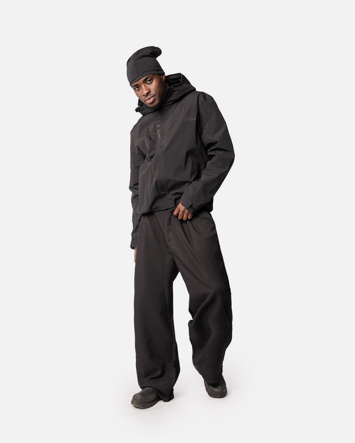 Delta Rain Jacket Black, product view 3 on a light grey background