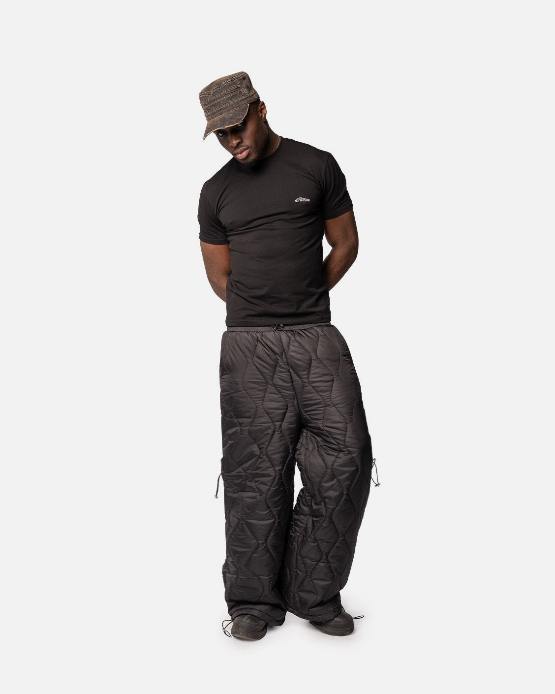 Onyx Puffer Pants, product view 1 on a light grey background