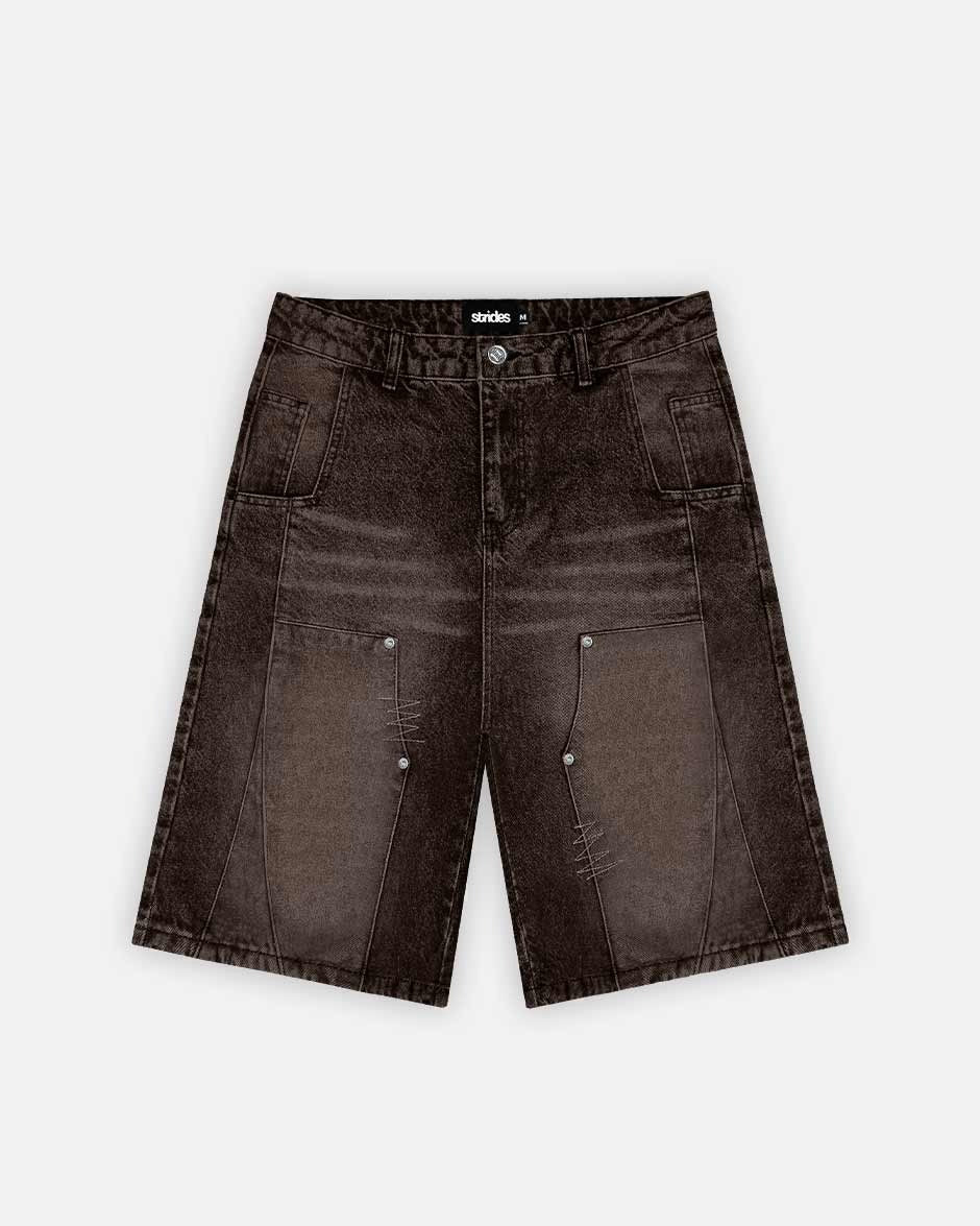 A pair of brown carpenter split jorts with a wide fit, featuring a logo leather patch and custom logo button.