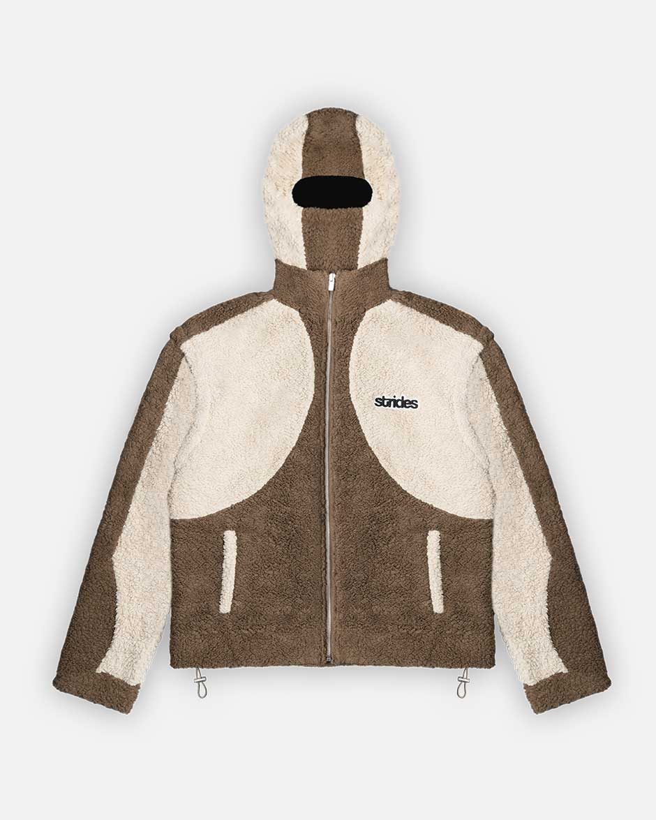 A brown and beige fleece jacket with detachable balaclava hood and logo embroidery, featuring a zipper front and drawstrings.