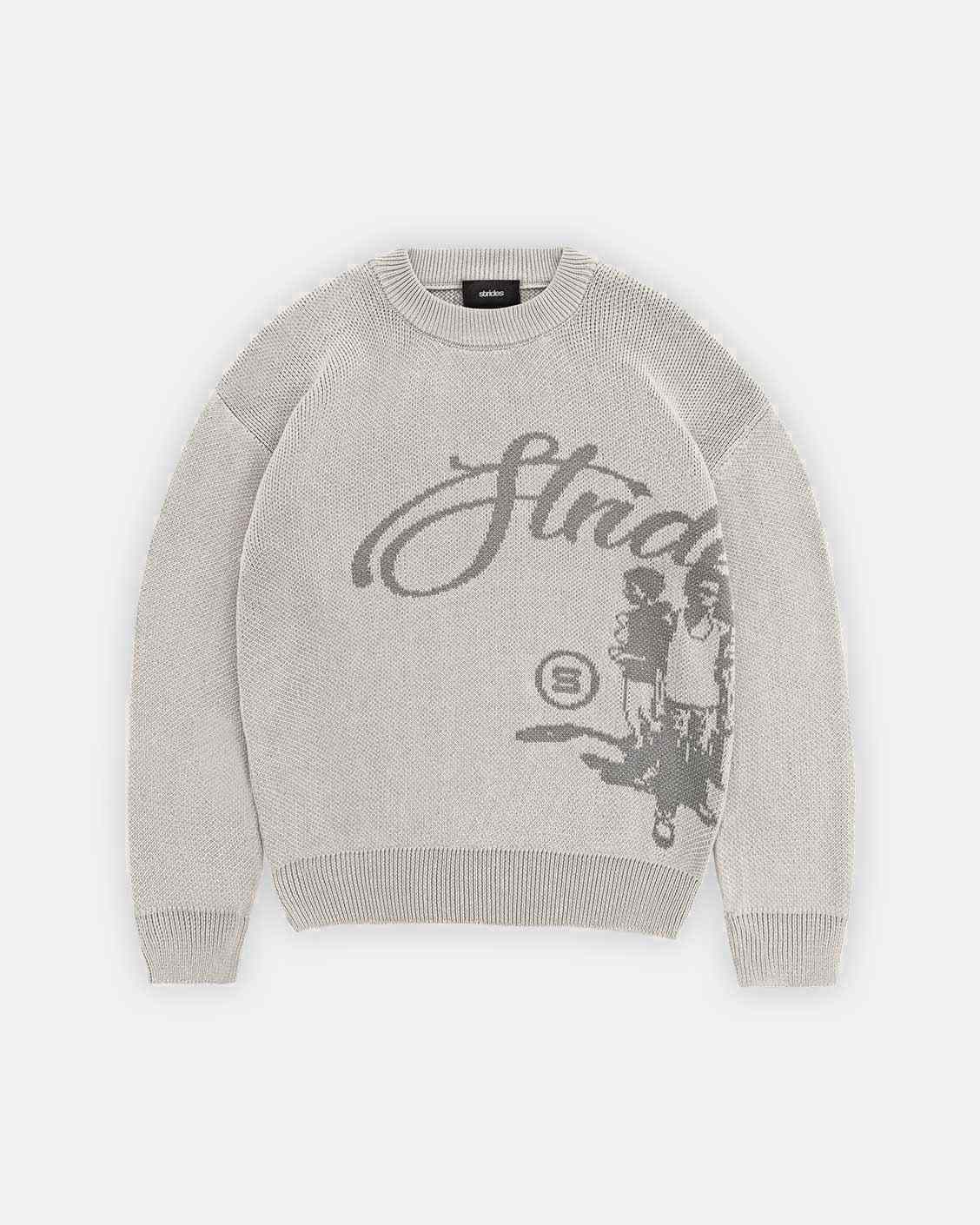 Gray sweater with graphic design on a white background