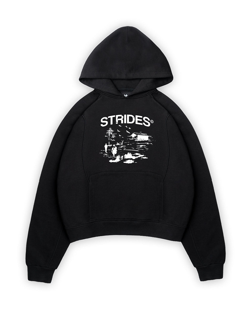 Black hooded sweatshirt with 'STRIDES' text and a graphic print on the front.