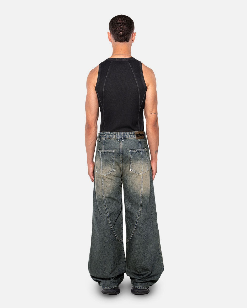 Claw Denim Dark Blue Yellow, back view on a light grey background