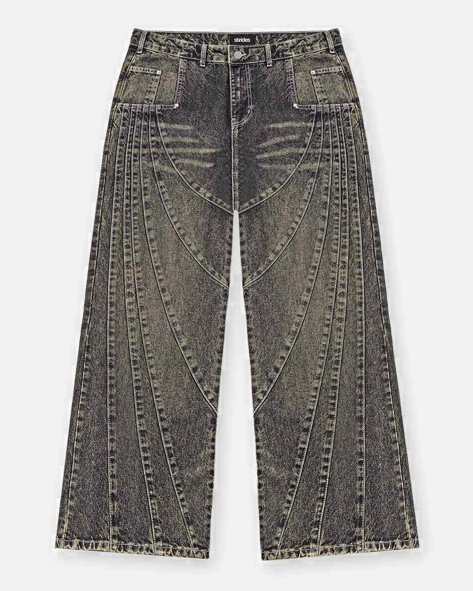 A pair of dark blue denim jeans with a wide fit and distinctive yellow wash details, featuring a logo leather patch and custom logo button.