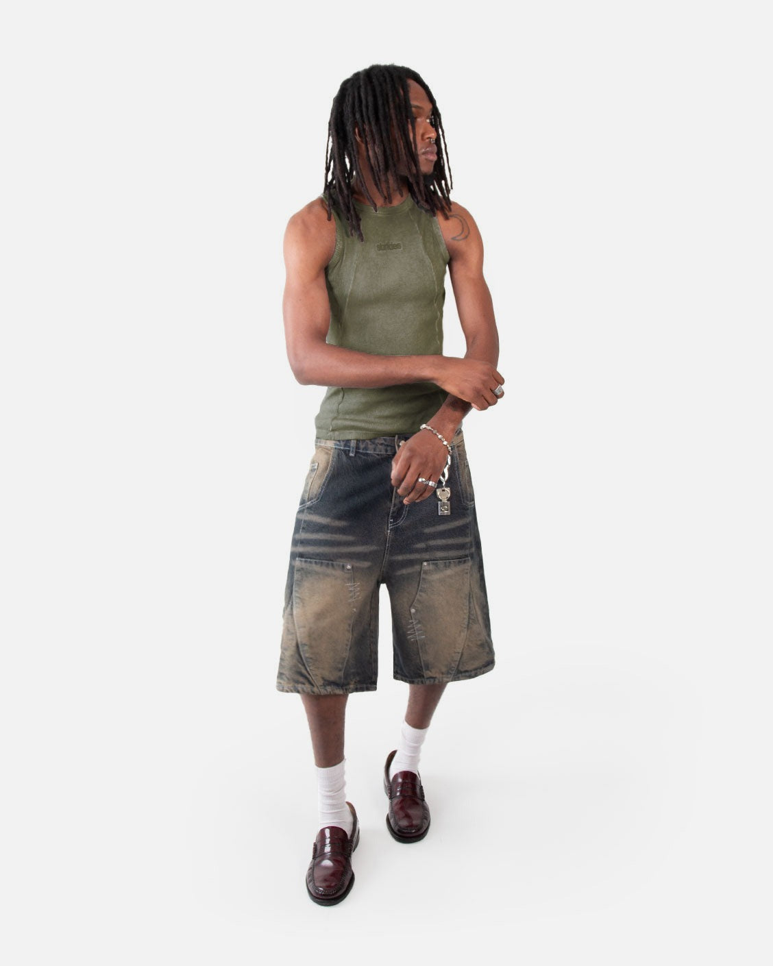 Line Tank Top Olive Oil Wash, worn by a model on a light grey background