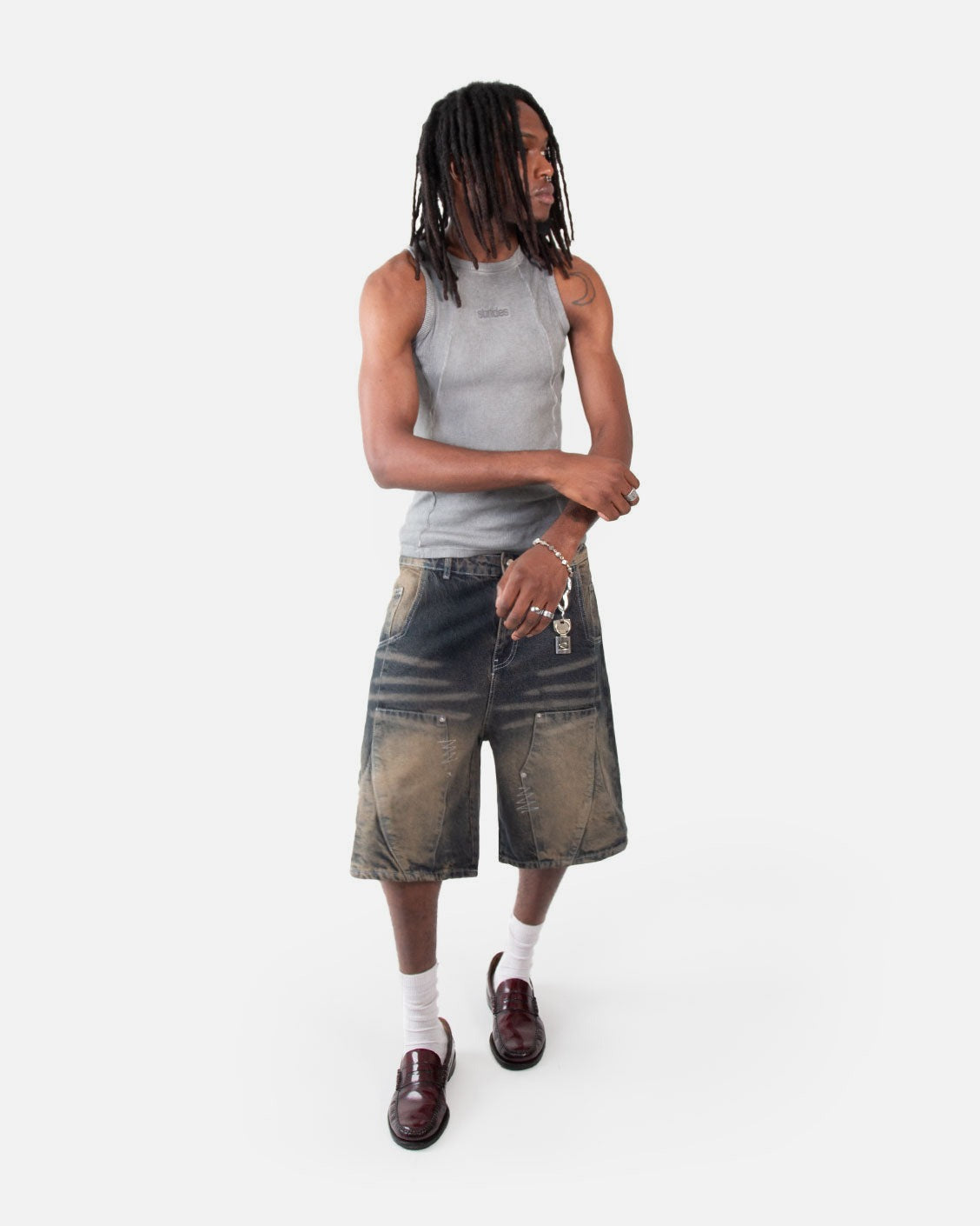 Carpenter Split Jorts Dark Blue Yellow, worn by a model on a light grey background