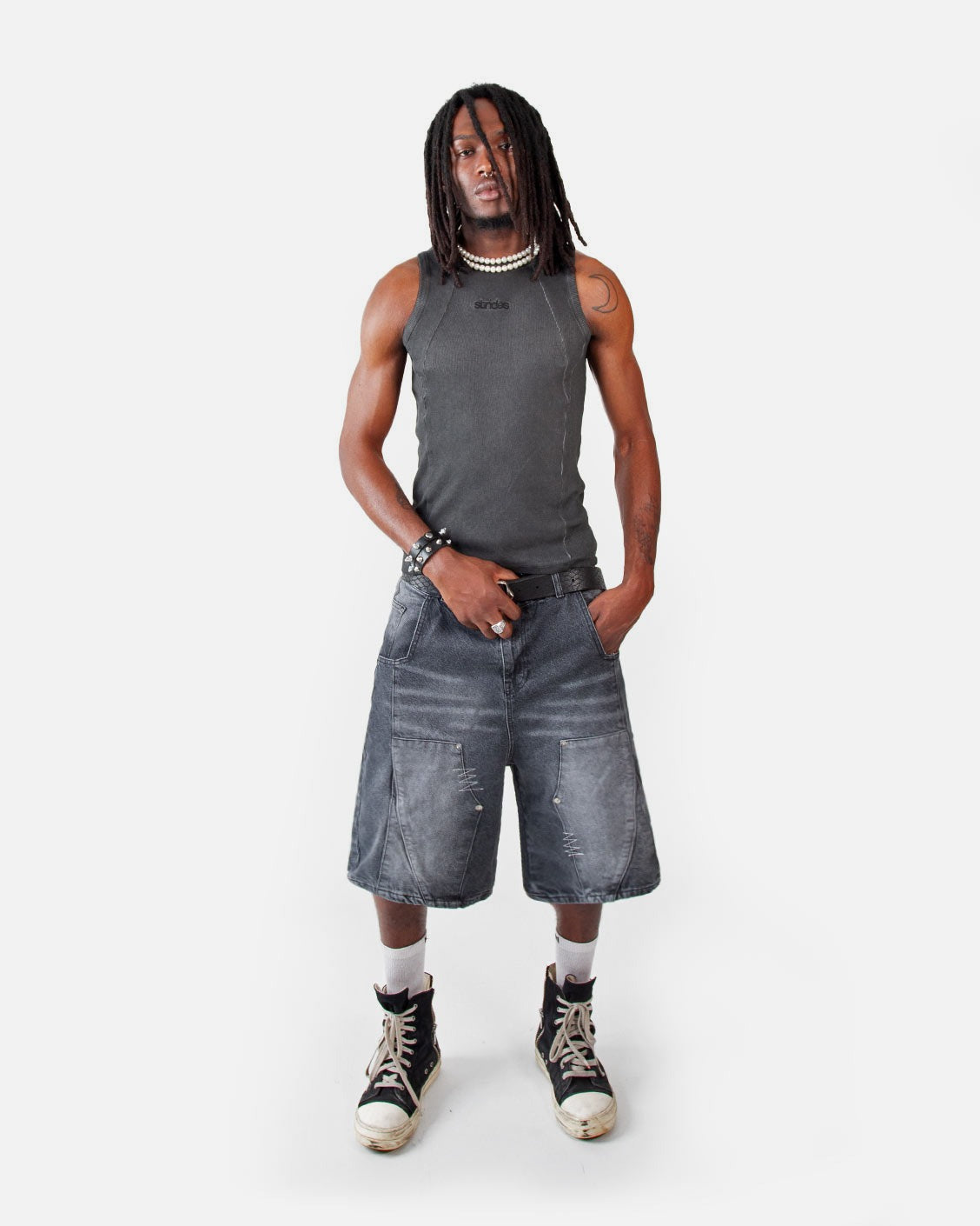 Line Tank Top Black Oil Wash, worn by a model on a light grey background