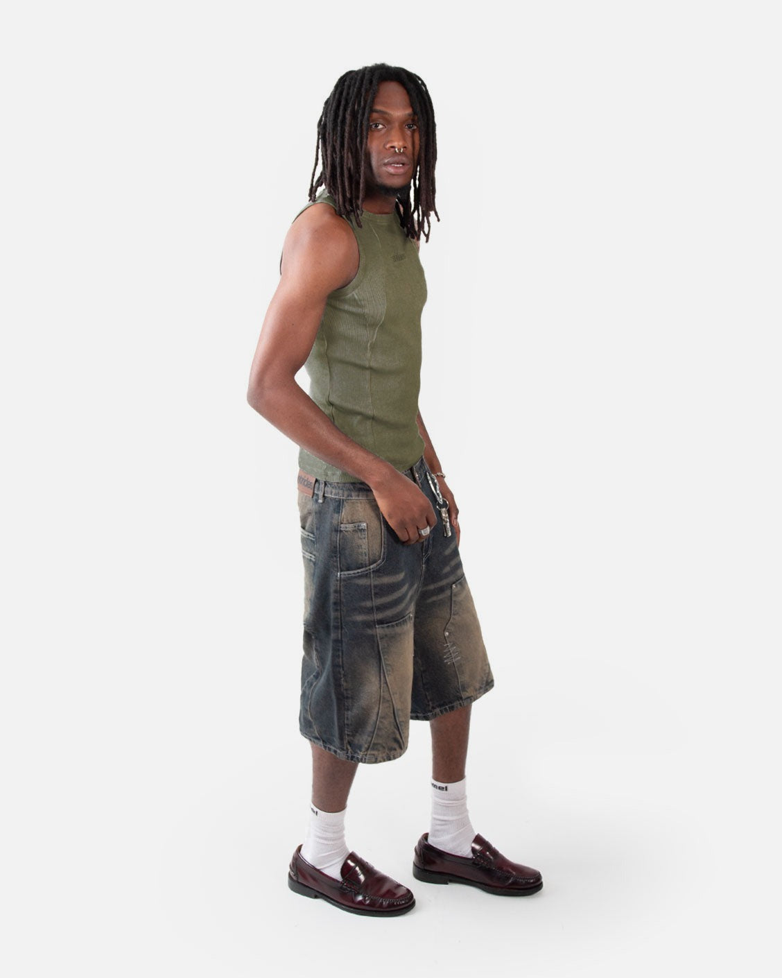 Line Tank Top Olive Oil Wash, worn by a model on a light grey background
