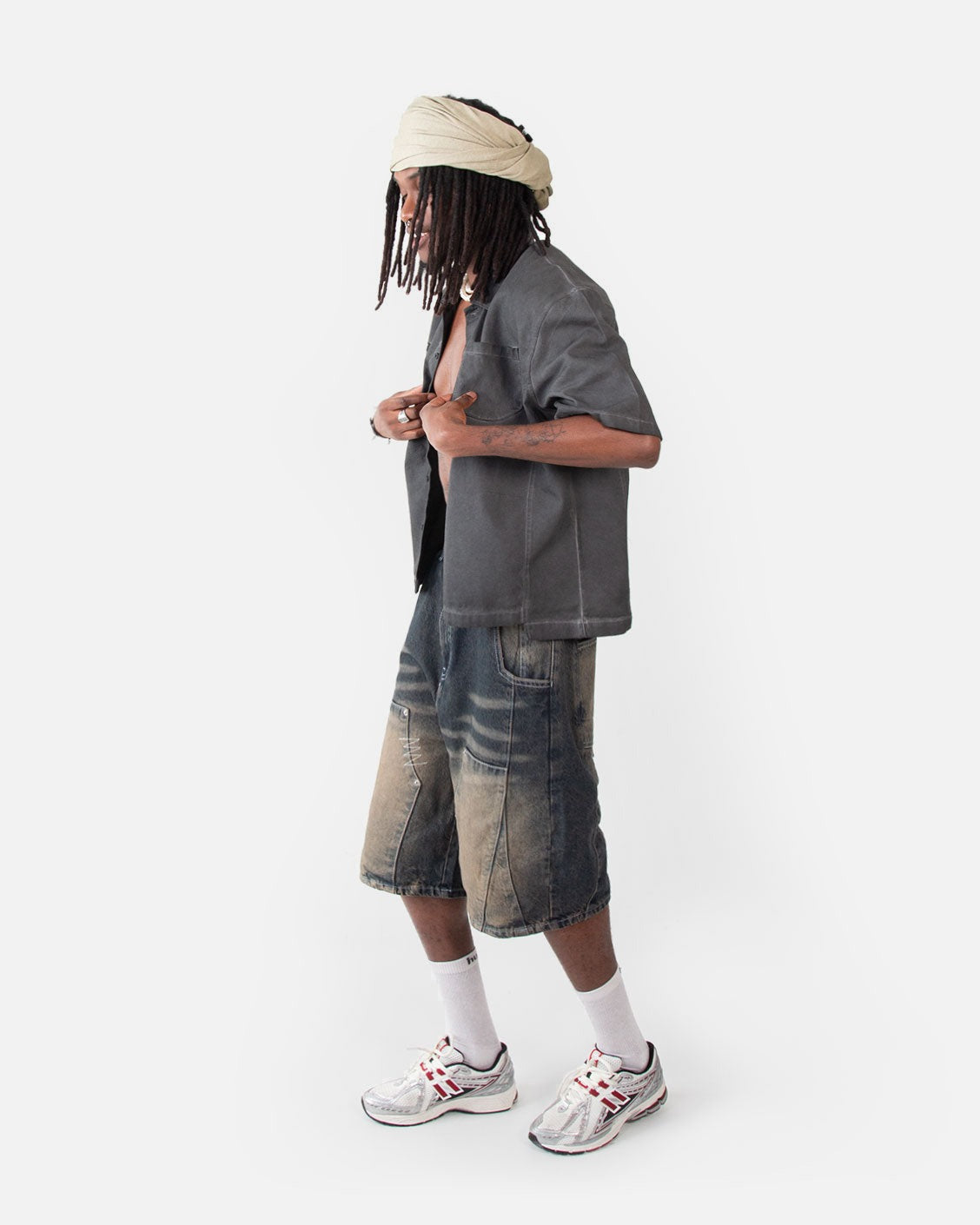 Carpenter Split Jorts Dark Blue Yellow, worn by a model on a light grey background