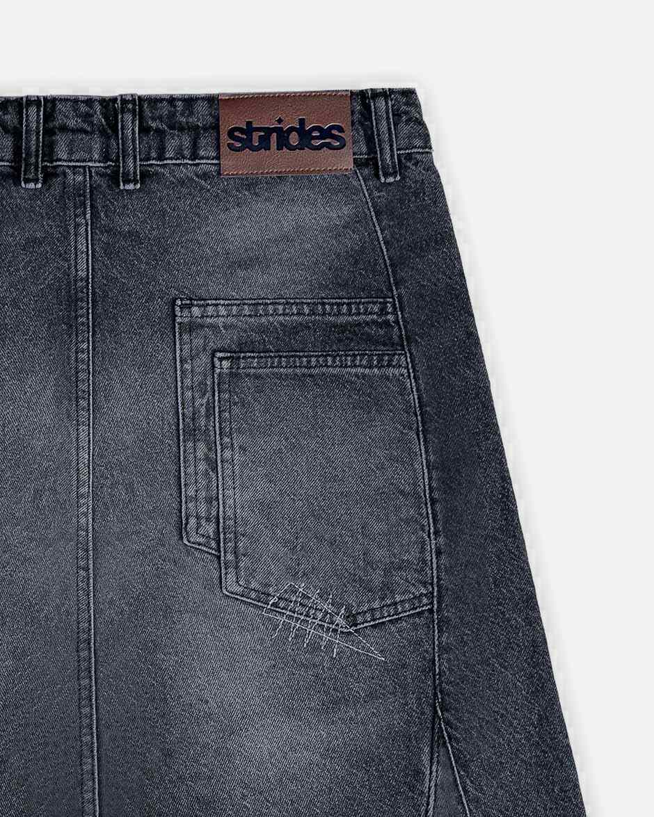 Carpenter Split Jorts Black, back view on a light grey background