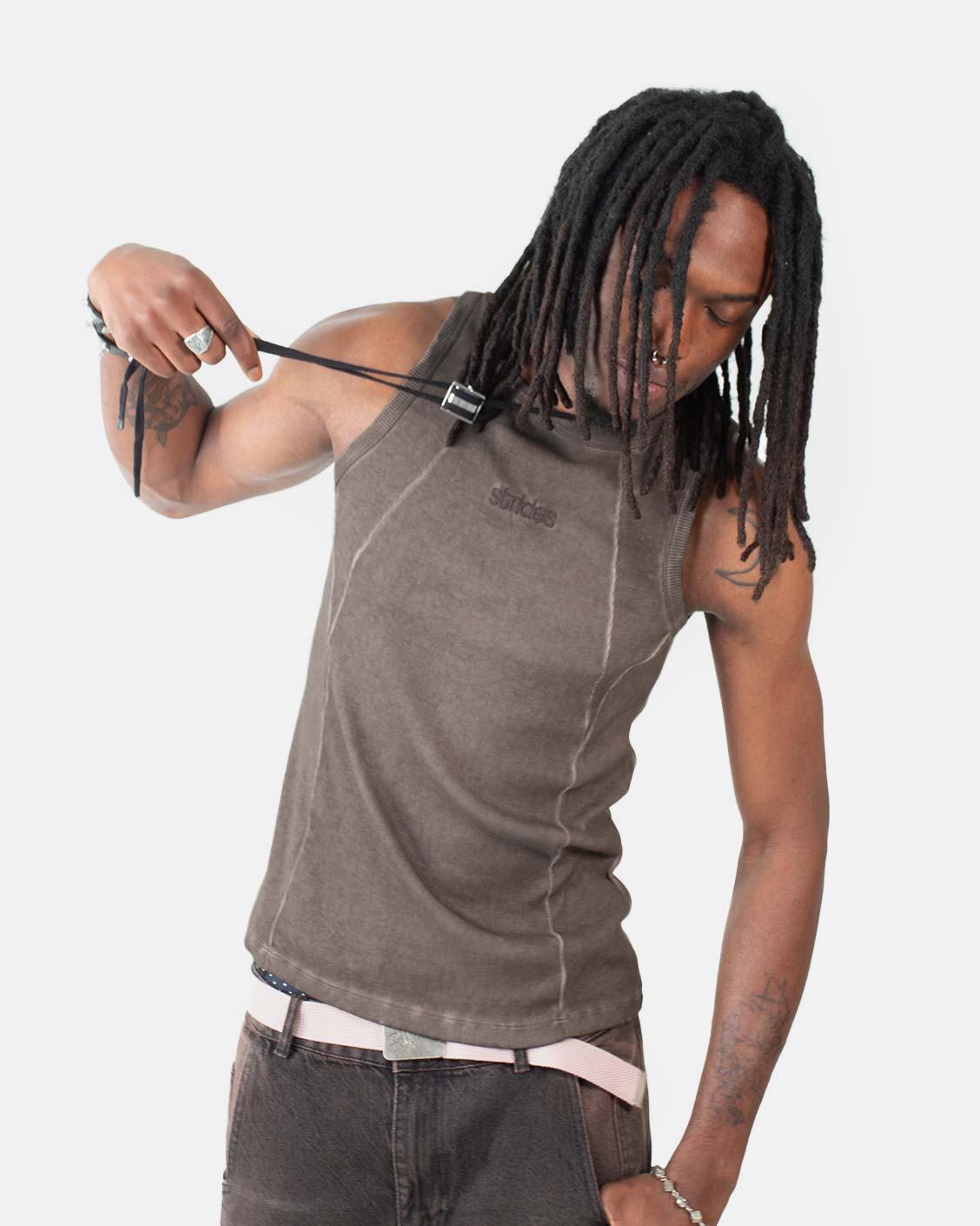 Line Tank Top Brown Oil Wash, worn by a model on a light grey background