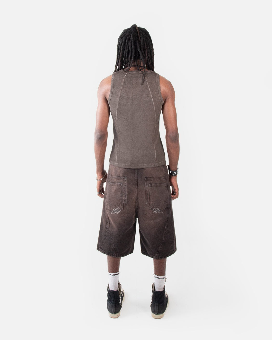 Line Tank Top Brown Oil Wash, worn by a model on a light grey background