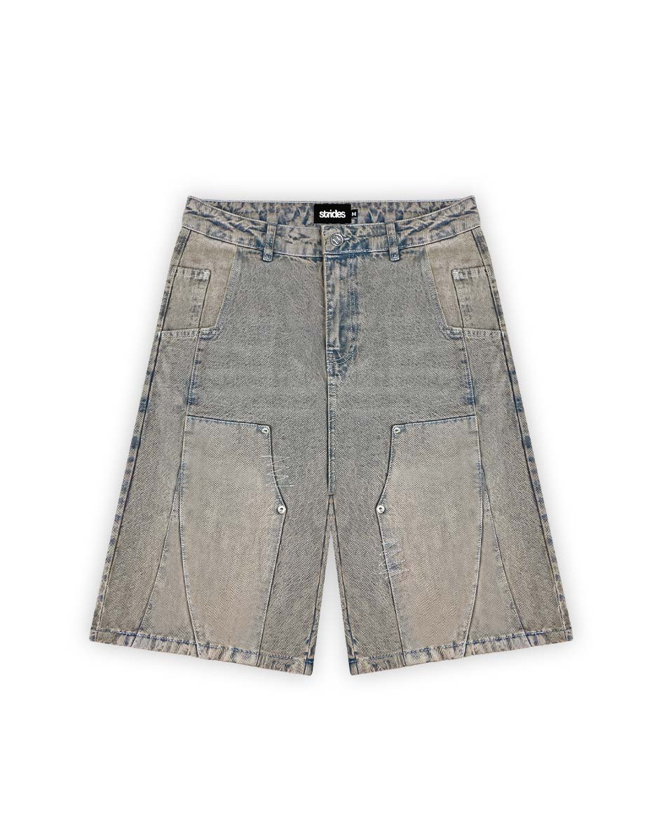 A pair of gray and yellow carpenter style shorts with a wide fit and logo patch on the waistband.