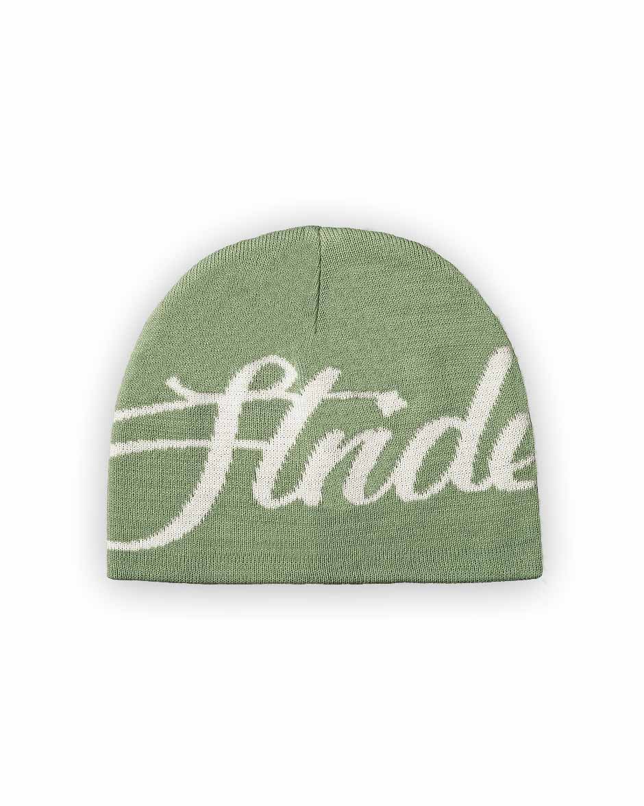 A green beanie hat with the brand name 'Sted' written across the front in white jacquard knitting.