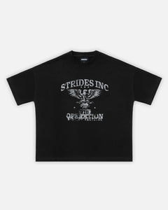 Black t-shirt with 'Strides Inc' logo on a white background