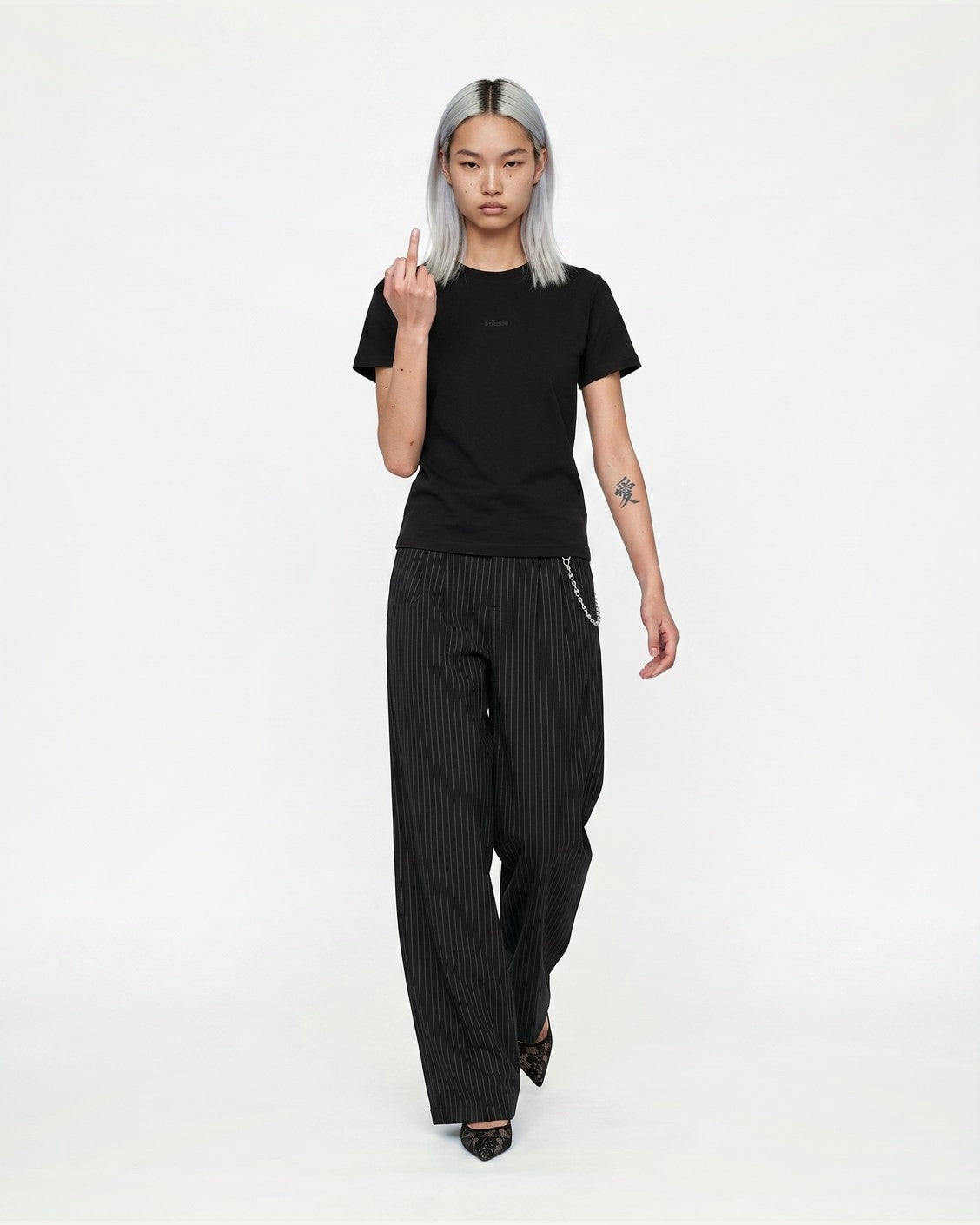 Slim Tee Black, product view 5 on a light grey background
